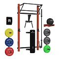 Sports Equipment Set Featuring Red Power Rack Weight Bench Colorful Rogue Plates And Medicine Ball