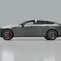 Gray Luxury Sports Sedan With Sleek Profile Large Alloy Wheels And Rear Spoiler