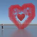 Red Heart Shaped Sculpture With Grid Structure And Central Small Heart As Person Looks Up