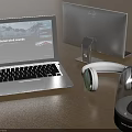 Modern Laptop And Dell Monitor Setup With Headphones On Wooden Desk