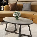 Round Coffee Tables with White Flower Bouquet Tea Set Living Room Beige Sofa Decorative Pillows