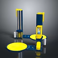 Blue And Yellow Equipment With Two Vertical Columns Yellow Circular Platforms And White Pillars