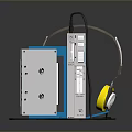 Vintage Computer Audio Player In Blue Silver With Yellow Headphones And Cable