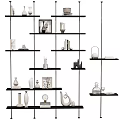 Decorative Ornaments Set on Black Multi Layered Shelf with Vases Sculptures Photo Frames and Books