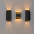Modern Black And Gold Wall Sconces With Sleek Design And Ambient Lighting