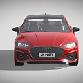 Red Sporty Two Door Coupe With Black Roof UK License Plate And Black Wheels