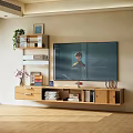 Modern Living Room Wall Mounted TV With Wooden TV Stand Books Decorative Items Green Plant