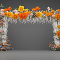 Decorative Flower Arch With Yellow Orange Blooms White Poles And Colorful Small Flowers At Base