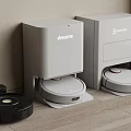 Robotic Vacuum Cleaners Including Dreame And Deebot With Charging Docks On Floor