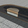 Curved Garden Water Feature With Perforated Top Flowing Water Black Pebbles And Gray Stone Pavement