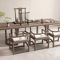 Modern Chinese Style Wooden Tea Table and Chairs with Tea Set and Potted Plant