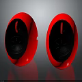 Two Red Circular Electronic Appliances With Sleek Black Front Panel Design