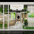 Modern Cosori Store Interior With Display Shelves Products Green Plant Decor And Wooden Counters