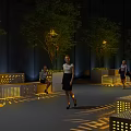 Yellow Public Chairs With Illuminated Design And Trees In Urban Setting