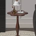 Elegant Wooden Side Table With Petal Shaped Top Gold Lamp Books And Small Cup