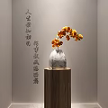 Orange Flowers in Glass Vase on Wooden Stand with Calligraphy Background Wall Decor
