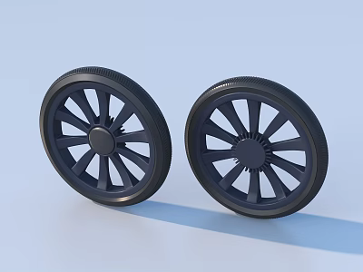 Two Black Wheels With Spoke Design On Light Colored Background 3d model