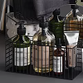 Bathroom Accessories Organized In Black Wire Baskets With Gray Towels Toiletries Mirror And Soap