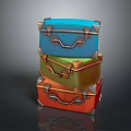 Vintage Colorful Trunks Stacked in Blue Green Orange Hues with Metal Accents