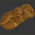 Freshly Baked Golden Brown Braided Bread With Sesame Seeds And Soft Fluffy Texture
