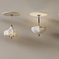 Set of Four White Patterned Ceiling Pendant Lights with One Illuminated Shade