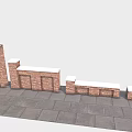 Outdoor Red Brick Wall Structures With Varying Heights And Gray Stone Pavement