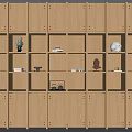 Light Wood Bookcase With Multiple Open Shelves Holding Decorative Vases And Books