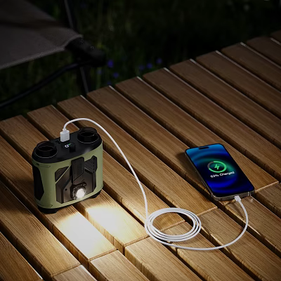 Outdoor Wooden Table Setup With Smartphone Charging And Portable Digital Speaker 3d model
