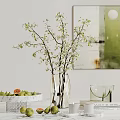 Decorative Ornament Set With Clear Vase Green Branches White Fruit Plate And Green Wall Art