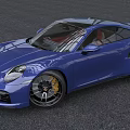 Blue Porsche Sports Car Coupe With Sleek Exterior Black Alloy Wheels And Red Leather Interior