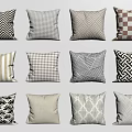 Decorative Pillows With Various Patterns In Beige Brown Black White Neutral Tones On Light Wall
