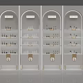 White Beauty Display Shelves With Arched Tops And Gold Accents For Cosmetic Products