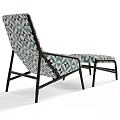 Modern Accent Chair with Ottoman Featuring Geometric Pattern and Dark Metal Frame
