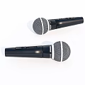 Two Black Handheld Microphones With Silver Mesh Grille And Ergonomic Grip Design