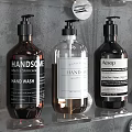 Modern Bathroom Accessories Including Shelves Towel Racks Soap Dispensers Towels And Toothbrush Holders