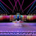 Vanke Event Stage Setup Featuring Vibrant Colored Lights Colorful Backdrop Panels And Audience Seats