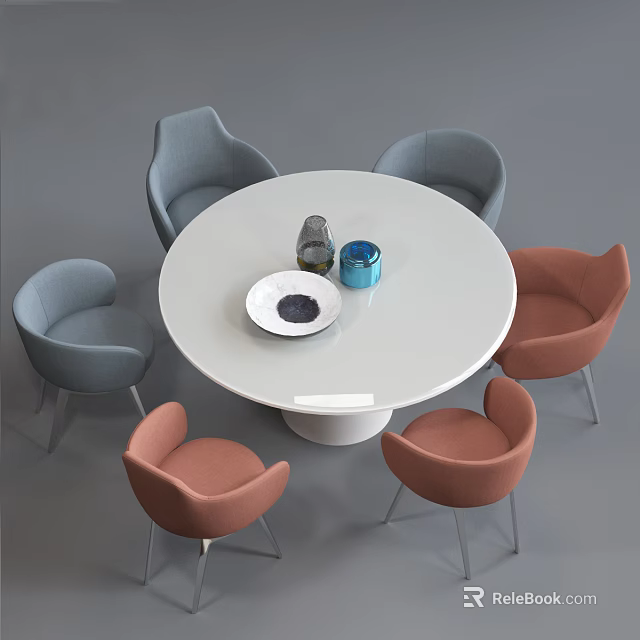 Modern Round Dining Table Set With Gray And Orange Chairs And Tabletop Decor 3d model