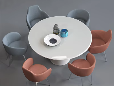 Modern Round Dining Table Set With Gray And Orange Chairs And Tabletop Decor 3d model