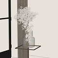 White Floral Bouquet in Transparent Glass Vase on Golden Frame Table by Window