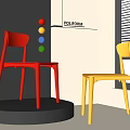 Poliform Red Yellow Single Chairs on Black Platform White Room with Colorful Balls Window Blinds