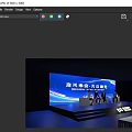 SPD Bank Themed Stage with Illuminated Blue Lighting Branded Display Stands and Digital Screens