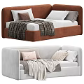 Modern Brown And White Velvet Sofa Bed With Decorative Pillows And Soft Blankets