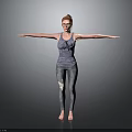 Child Standing With Arms Outstretched In Gray Tank Top And Ripped Jeans Against Gray Background