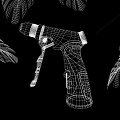 Handheld Household Tool With Black Handle Silver Metal And Wooden Nozzle Against Green Leaves Background