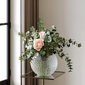 Crystal Textured Vase With Pink Roses And Eucalyptus Leaves On Golden Shelf By Window