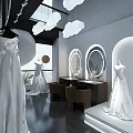 Modern Bridal Shop Interior With Elegant Hanging Wedding Gowns And Full Length Mirrors