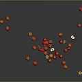 Red And Orange Small Fruits Scattered On Black Background With Sliced Ones Showing Seeds