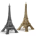 Silver And Gold Eiffel Tower Decorative Miniature Models Showcasing Elegant Design On White