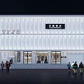 Illuminated White Storefront Facade of Clothing Shop With Signboard and People at Night