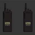 Two Black Walkie Talkies As Electronic Communication Devices With Digital Display And Antennas